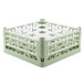 A light green plastic Vollrath glass rack with 16 compartments.