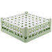 A light green plastic Vollrath glass rack with white compartments.