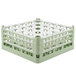 A light green plastic Vollrath glass rack with 25 compartments.