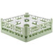A light green plastic Vollrath glass rack with nine compartments.