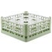 A light green plastic Vollrath glass rack with 9 compartments.