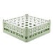 A light green plastic Vollrath glass rack with white compartments.