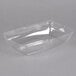 A clear plastic Sabert catering tray with a high dome lid.