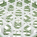 A white and green plastic Vollrath glass rack with 25 compartments.