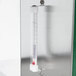 A metal Hatco countertop warmer with a thermometer on the front.