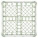 A white and green plastic Vollrath lemon drop glass rack with 30 compartments.