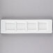 A rectangular white Tuxton china platter with four square compartments.