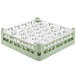 A Vollrath light green plastic glass rack with 30 compartments.