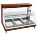 A Hatco copper countertop display case with three shelves.