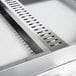 A close-up of a Hatco countertop hot food display warmer drain.