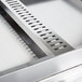 A close-up of a Hatco stainless steel countertop drain.