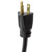 A black power cord with a gold plug on a Hatco countertop warmer.