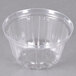 A clear plastic high dome lid on a clear plastic bowl.