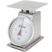 An Edlund heavy-duty portion scale with a stainless steel platform and white dial.