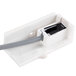 A white plastic Magnetic Bin Switch Assembly with a black cable.