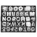 A tray of Aarco white Helvetica letters and numbers.