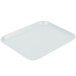 A white Cambro Camlite tray with a handle.