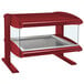 A red Hatco countertop heated zone merchandiser with a glass top.