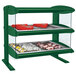 A green Hatco countertop heated zone merchandiser with food on it.