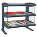 A gray Hatco countertop display warmer with food on shelves.