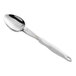 A Vollrath Jacob's Pride heavy-duty serving spoon with a white handle.