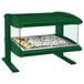 A green Hatco countertop food warmer with foil wrapped food on a shelf.