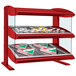 A red Hatco countertop heated zone merchandiser with food on shelves.