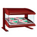 A red Hatco countertop heated display case with pizza boxes inside.