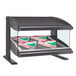 A black display case with pizza boxes inside on a counter.