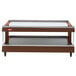 A brown and silver Hatco countertop heated display shelf in a bakery.