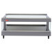 A Hatco gray granite heated glass merchandising warmer on a metal shelf.