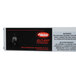 A black and white rectangular power supply with a black and red label.