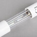 A white tube with a small clear light inside.