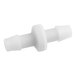 A white plastic pipe connector with a round top.