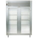 A Traulsen Specification Line two section glass door refrigerator with a stainless steel exterior.