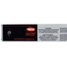 A black and white rectangular box with a knob and a button with a black and white label with red text.