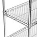 A Metro chrome wire shelving unit with three shelves.