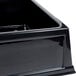 A Geneva black rectangular insulated beverage bin on a counter.