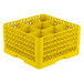 A yellow plastic Vollrath Traex glass rack with 9 compartments.