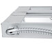 A metal box with a metal tube and flexible metal hoses.