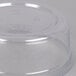 A Fabri-Kal clear plastic deli container with a lid.