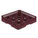 A red plastic Vollrath Traex glass rack with 9 burgundy compartments.