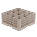 A beige Vollrath Traex glass rack with nine compartments.
