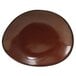 A brown TuxTrendz ellipse china plate with a black rim.