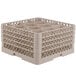 A beige plastic Vollrath Traex glass rack with 12 compartments.