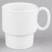 A Tuxton porcelain white mug with a handle.