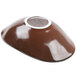 A brown bowl with a white rim.