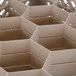 A beige plastic Vollrath Traex rack with open rack extender on top.