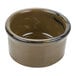 A brown ceramic Tuxton ramekin with a black rim.