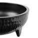 A black melamine molcajete bowl with legs.